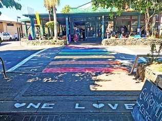 This pedestrian crossing at Nimbin was painted in rainbow colours for free. It will cost $10,000 in Lismore.