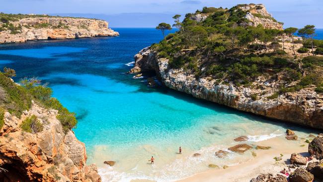 SUNDAY ESCAPE. MEDITERRANEAN ISLANDS. Mallorca. View of Cala des Moro beach and its azure blue water, Majorca island, Spain. Picture: iStock