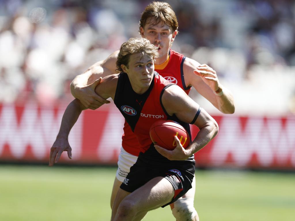 Xavier Duursma tries to slip clear of Dan Curtin. Picture: Michael Klein