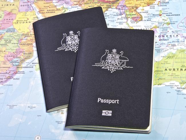 Australian Passport With the World map in the Background