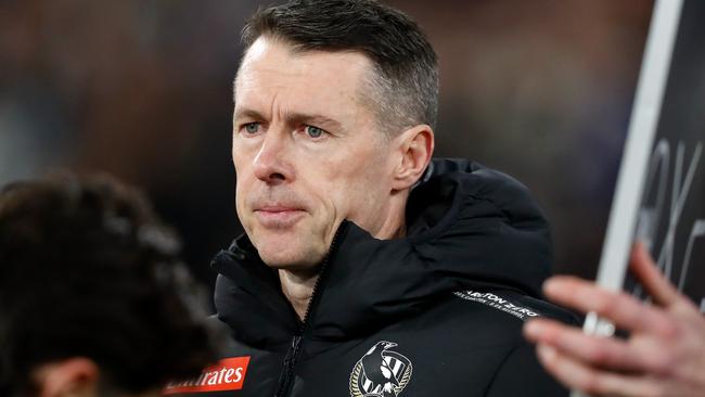 Craig McRae addresses his players at three-quarter time. Picture: Dylan Burns/AFL Photos via Getty Images