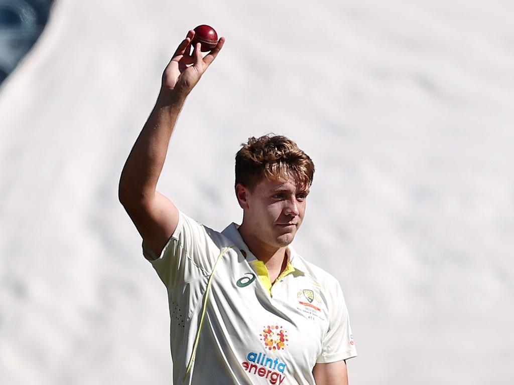 Cameron Green celebrates with teammates after getting his fifth wicket. Picture: Michael Klein