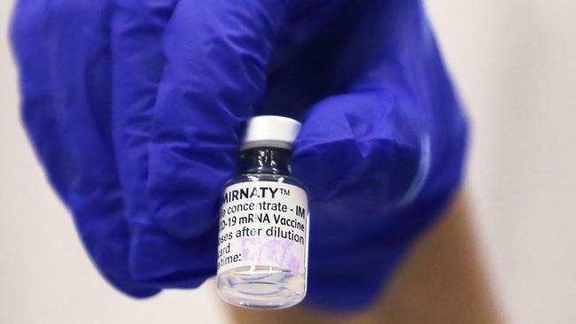 A vial of the Pfizer vaccine which has been in high demand across Australia. Picture: Steven Saphore/AFP