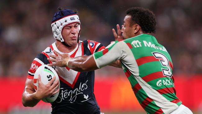SYDNEY, AUSTRALIA - MARCH 17: Joseph Manu of the Roosters is tackled by Isaiah Tass of the Rabbitohs during the round three NRL match between Sydney Roosters and South Sydney Rabbitohs at Allianz Stadium on March 17, 2023 in Sydney, Australia. (Photo by Mark Kolbe/Getty Images)