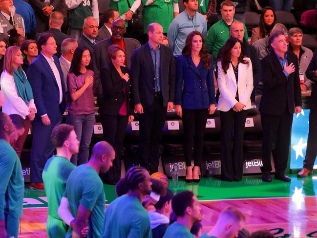 The royal couple stood for the National Anthem ahead of the NBA game. Picture: AFP.