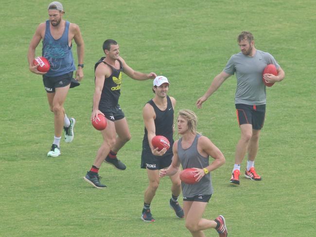 Banned Bombers Cale Hooker, Brent Stanton, Ben Howlett, Dyson Heppel and Stewart Crameri, now with the Bulldogs, train during their ban. Picture: Hamish Blair