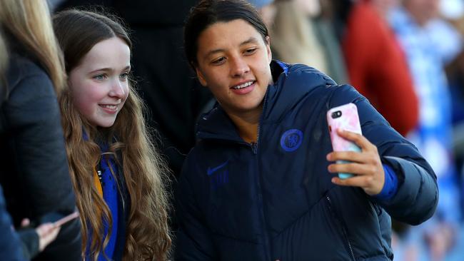 BOREHAMWOOD, ENGLAND - JANUARY 19: Sam Kerr of Chelsea takes a selfie photograph with a fan after the Barclays FA Women's Super League match between Arsenal and Chelsea at Meadow Park on January 19, 2020 in Borehamwood, United Kingdom. (Photo by Catherine Ivill/Getty Images)