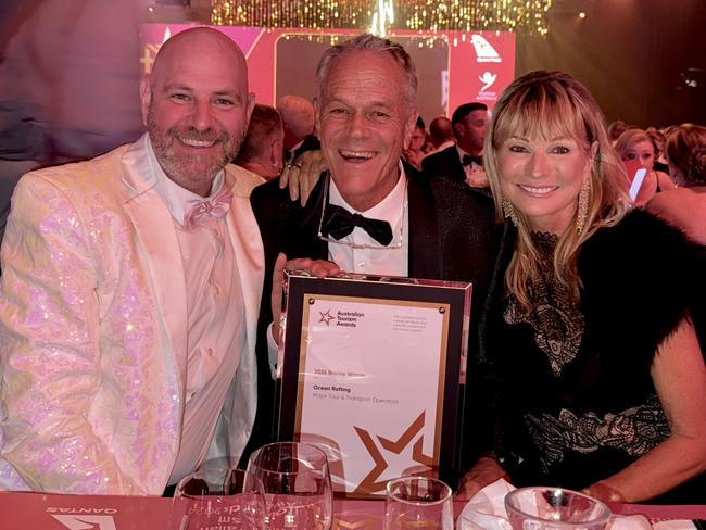 Nathan Fleming and Jan and Peter Claxton, the owners of Ocean Rafting, celebrating their bronze award at the Qantas Australian Tourism Awards. Photo: Contributed.