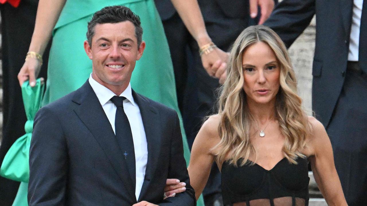 Rory McIlroy and wife Erica Stroll arrive for a team photo on the Spanish Steps after an official Team photo ahead of the 44th Ryder Cup. Photo by Alberto PIZZOLI / AFP.