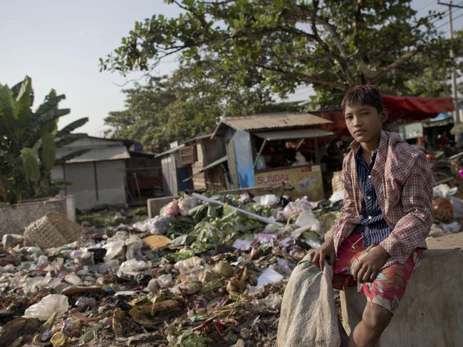 Myanmar children sniff glue to forget hunger | news.com.au — Australia ...