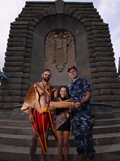 Jack and Mahleaha Buckskin with Air Force Indigenous liaison officer Steven Warrior at the Anzac Day Dawn Service. Picture Naomi Jellicoe