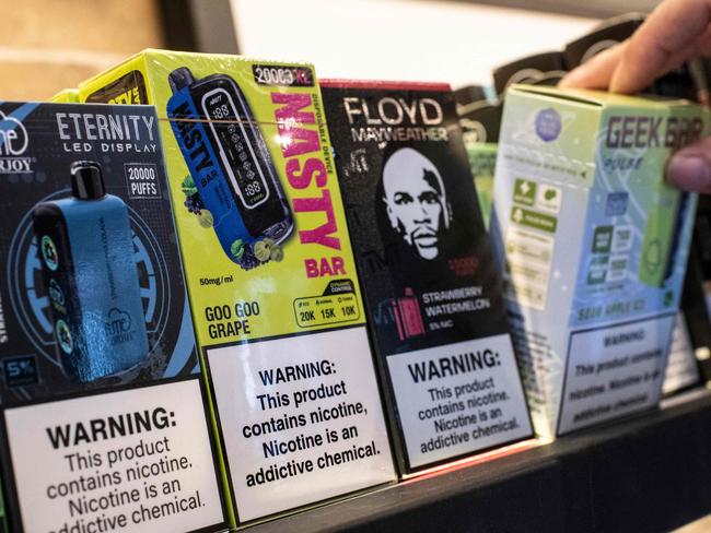 The opposition has slammed new vaping regulations as ‘unworkable’, saying they will drive vape users to the black market. Picture: Ezequiel Bacerra, AFP