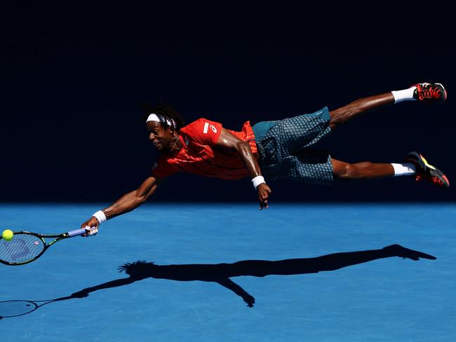 Sports - Second Prize, Singles © Cameron Spencer, Getty Images Title: The Dive Gaël Monfils of France dives for a forehand in his fourth round match against Andrey Kuznetsov of Russia, during the 2016 Australian Open at Melbourne Park, Australia, on 25 January 2016. The Australian Open holds the record for the highest attendance at a Grand Slam event.