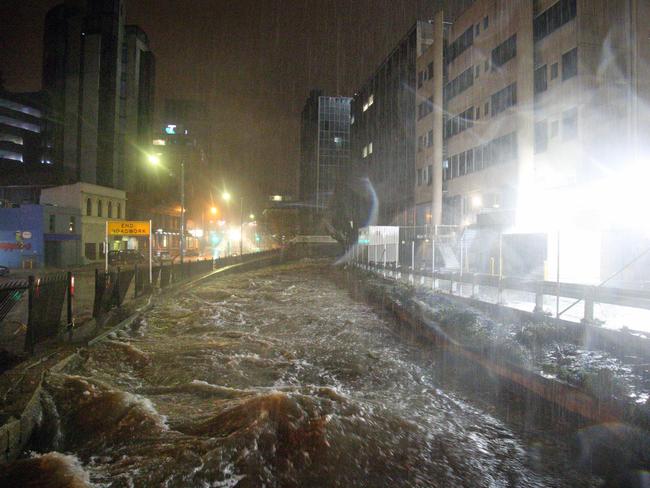 Wild weather swept through Hobart, flooding the CBD while the city slept. Picture: Patrick Gee