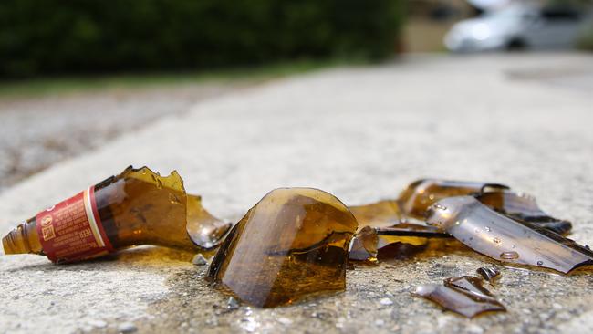 A man was arrested after he allegedly smashed a beer bottle on the footpath in the Airlie Beach Safe Night Precinct. Picture: Brendan Francis