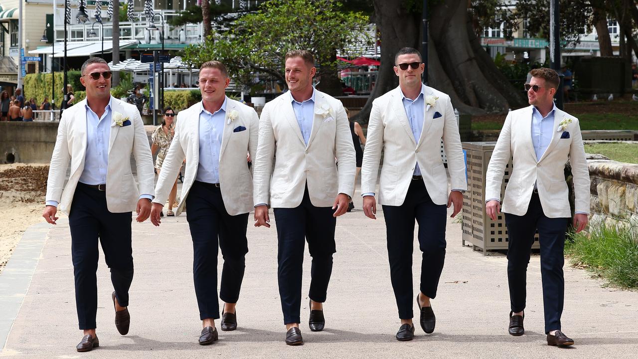 Tom wore a white blazer, with a blue shirt underneath that matched his groomsmen including SAS Australia winner Sam and his twin brother George. Picture: Matrix Media Group