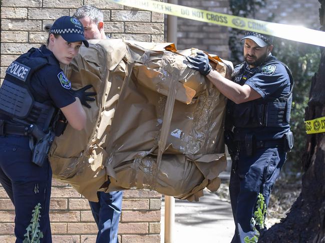 Thursday November 16 2023 Police and Major Crime Detectives removing a wrapped armchair at the scene of an unexplained death on St Margarets Cres, Felixstow.Picture: Roy VanDerVegt