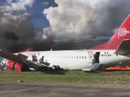 Plane burst into flames on a runway in Peru.