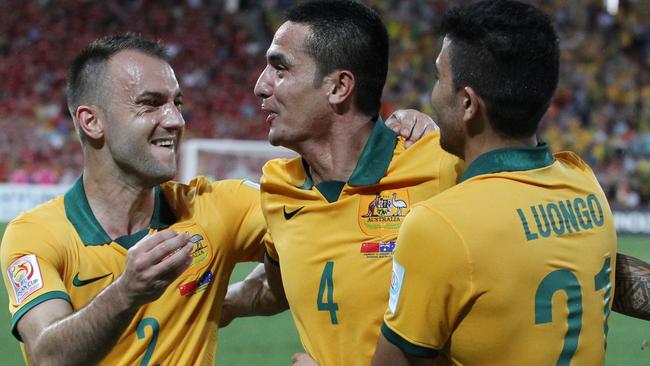 Ivan Franjic and Massimo Luongo celebrate Tim Cahill’s stunning brace.