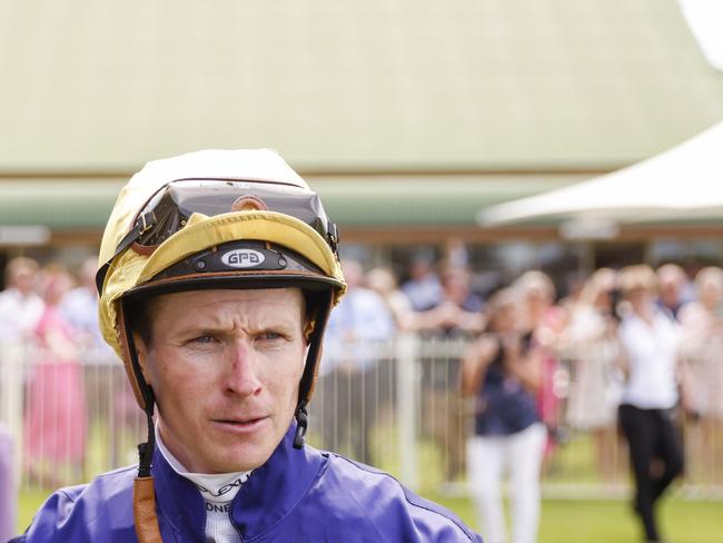 NEWCASTLE, AUSTRALIA - NOVEMBER 12: James McDonald  looks on after winning race 5 the Gavelhouse.com Midway Bm72 Handicap on Floating during Racing at Newcastle Racecourse on November 12, 2022 in Newcastle, Australia. (Photo by Mark Evans/Getty Images)