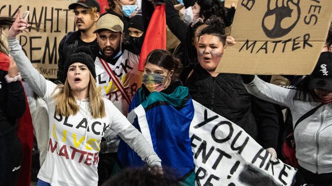 Protesters marching during a Black Lives Matter protest in Sydney. (AAP Image/James Gourley)