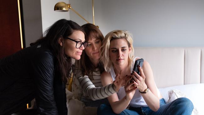 Director Clea DuVall (left) with her two leads.