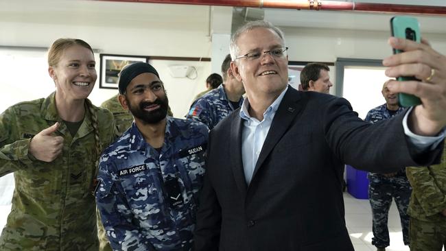 Prime Minister Scott Morrison grabs a selfie as he thanks Australian troops involved in the Afghanistan evacuation. Picture: Adam Taylor (supplied by the Prime Minister’s Office).