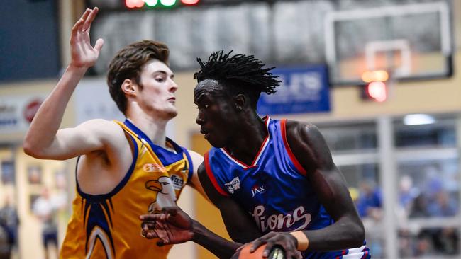 Forestville’s Michael Harris, left pictured defending Central Districts’ Jimma Dau last season, dominated for the Eagles. Picture: AAP/Morgan Sette