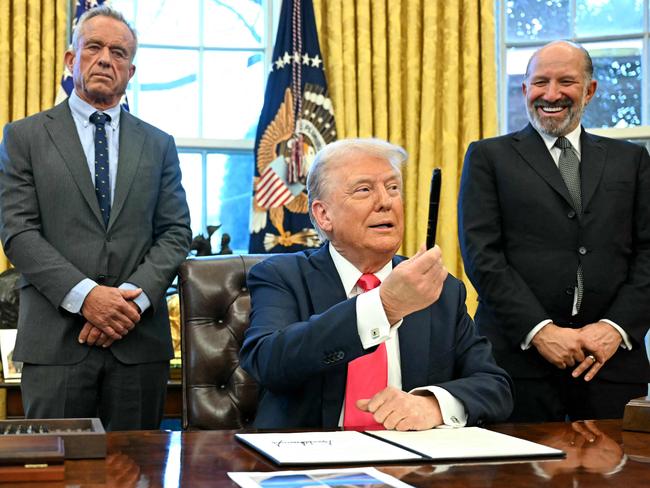 US President Donald Trump holds a Sharpie after signing an Executive Order, alongside US Secretary of Health and Human Services Robert F. Kennedy Jr. and US Secretary of Commerce nominee Howard Lutnick. Picture: AFP