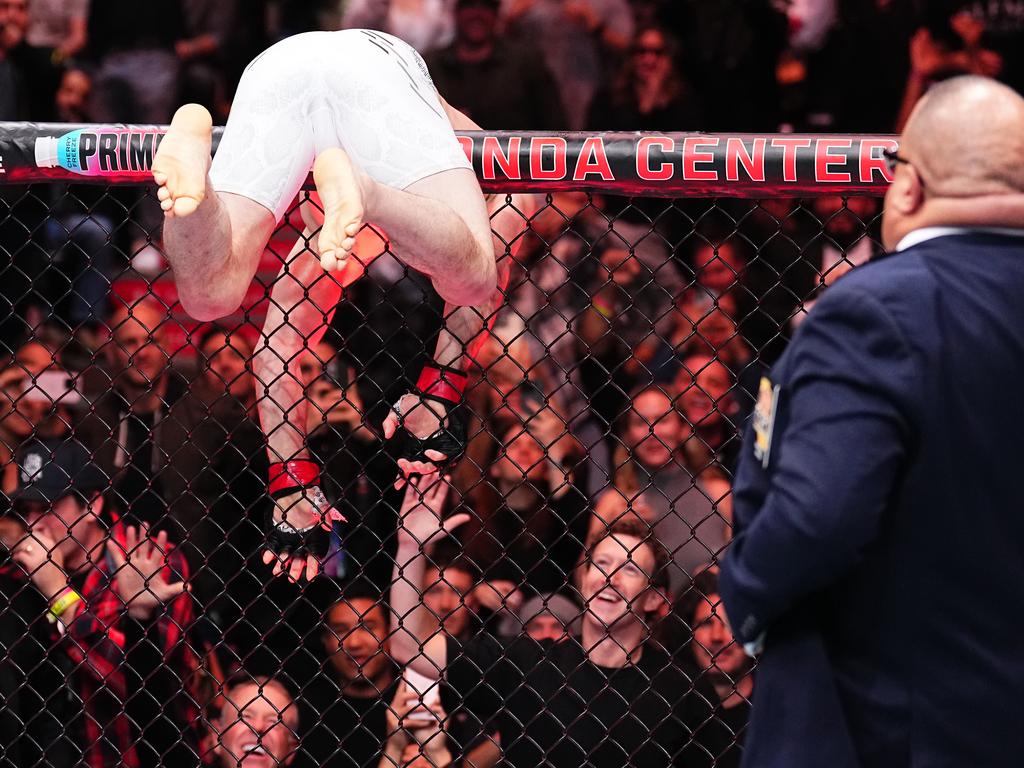 Dvalishvili greets Zuckerberg after beating Cejudo. Picture: Chris Unger/Zuffa LLC via Getty Images