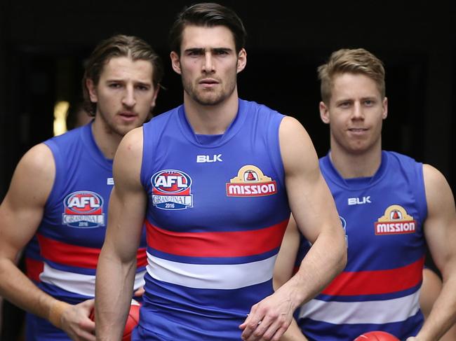 2016 AFL Grand Final match between the Western Bulldogs and the Sydney Swans at the Melbourne Cricket Ground (MCG), Melbourne, Australia on October 1, 2016. Easton Wood leads the Bulldogs out onto the MCG .Picture: Michael Klein