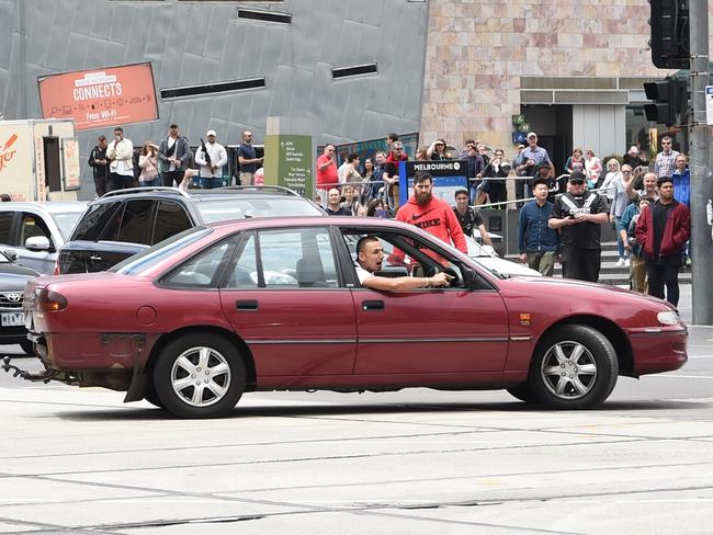 The car being driven on Bourke St, Melbourne, before the incident. Picture: Tony Gough