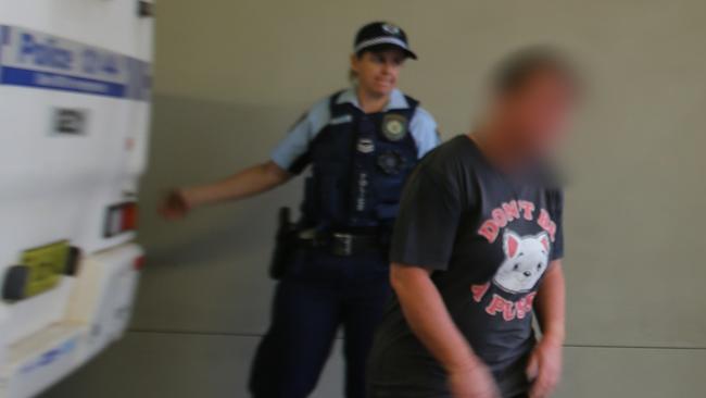 Tracey Gould being taken to Dubbo Police Station after her arrest. Picture: NSW Police