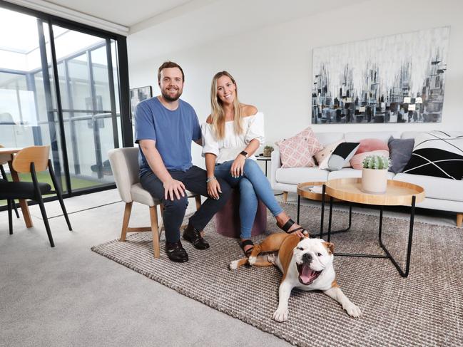 Michael Hancock and Holly Murrells with their bulldog Winston. Picture: Richard Dobson