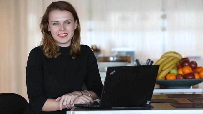 Anna Brotherson, who was hired by KPMG after a video job interview, at work in Sydney