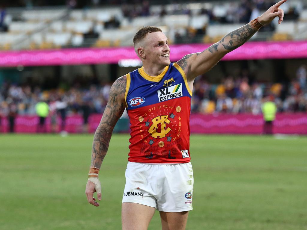 Mitch Robinson celebrates after kicking four goals for the Lions against the Giants. Picture: Jono Searle/AFL Photos/via Getty Images