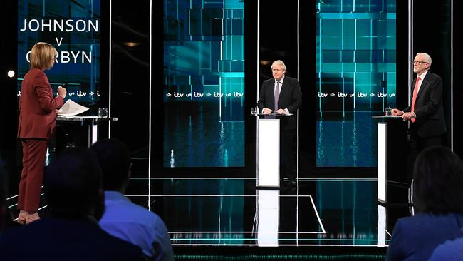 Host Julie Etchingham interviews Prime Minister Boris Johnson and Britain’s Labour Party leader Jeremy Corbyn (right). Picture: AFP /ITV/Jonathan Hordle