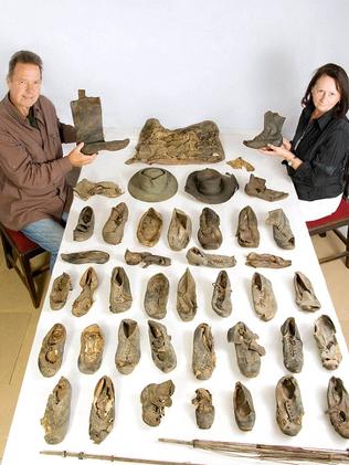 Allen and Linda Cooper with ritual magic items hidden in their Tasmanian farmhouse where five members of one 1800s family died ‘under an evil spell’. Picture: Steve Watts