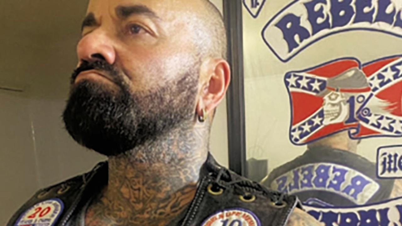 High profile Rebels bikie and son of national icon dead at 52