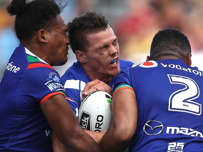 AUCKLAND, NEW ZEALAND - MARCH 16: Kerrod Holland of the Bulldogs is tackled during the round 1 NRL match between the New Zealand Warriors and the Canterbury Bulldogs at Mt Smart Stadium on March 16, 2019 in Auckland, New Zealand. (Photo by Phil Walter/2019 Getty Images)