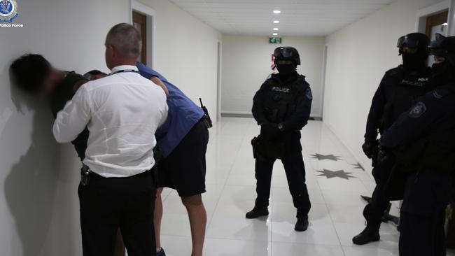 Police executed a search warrant at a property in Cabramatta, seizing several items for forensic examination. Picture: NSW Police