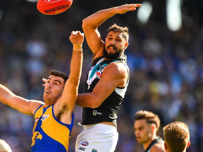 PERTH, AUSTRALIA - MAY 5: Paddy Ryder of the Power is tackled by Scott Lycett of the Eagles during the 2018 AFL round seven match between the West Coast Eagles and the Port Adelaide Power at Optus Stadium on May 5, 2018 in Perth, Australia. (Photo by Daniel Carson/AFL Media/Getty Images)