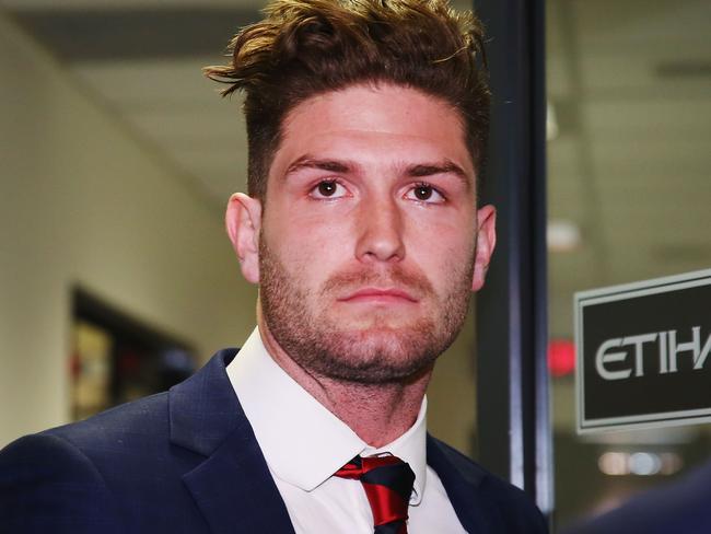 MELBOURNE, AUSTRALIA - JULY 04:  Melbourne Demons AFL player Tom Bugg leaves after receiving a six week suspension for striking Sydney's Callum Mills the AFL Tribunal at AFL House on July 4, 2017 in Melbourne, Australia.  (Photo by Michael Dodge/Getty Images)