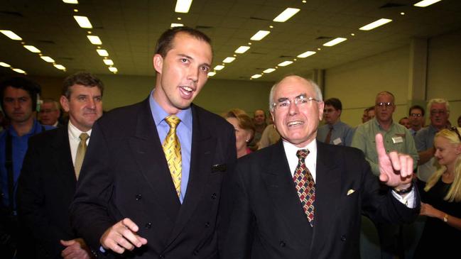 Local candidate Dutton campaigns with then-prime minister John Howard in the seat of Dickson in 2001.