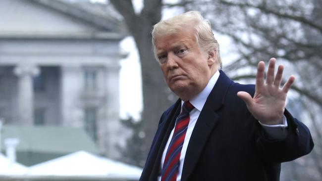 US President Donald Trump walks on the South Lawn of the White House yesterday. Picture: AP