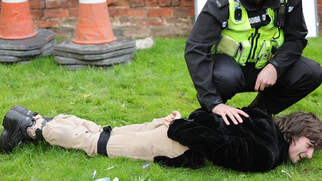 The protester was taken down by police (Photo by Chris Jackson/Getty Images)