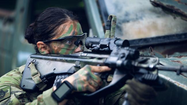 Australian Army officer Lieutenant Samantha May, from the 3rd Battalion, The Royal Australian Regiment, takes a sight picture during Exercise Wantok Warrior in Wewak, Papua New Guinea.