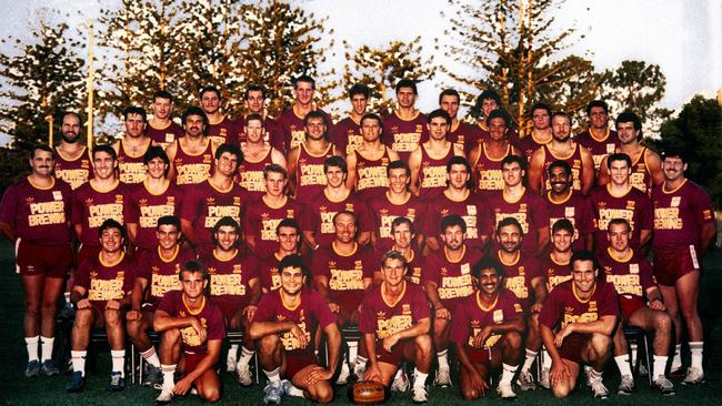 The inaugural Broncos squad of 1988 L-R B/ROW – Grant Rix, Tony Schafer, Scott Lewis, Andrew Tessmann, Peter Benson, Brad Foster, Craig Marshall, Dean Sammut, Alan Cann, G Thorogood. 3RD ROW – Mark Meskell, Michael Hancock, Colin Scott, Peter Sinclair, Terry Matterson, Brook Kennedy, Chris Johns, Brett Walters, Brad Tessmann, Greg Conescu. 2nd row – Darryl Brohman (reserve grade coach), Jason Hanrahan, David Bourke, Brett Plowman, John Plath, B Tengdahl, C Grauf, Ray Herring, G Manthey, Joe Kilroy, G Hogarth, Gene Miles. 1st row Billy Noke, A Gee, Andrew McCarron, Rohan Teevan, Wally Lewis (cpt), Wayne Bennett (coach), Greg Dowling, Bryan Niebling, Keith Gee, Mark Hohn. Kneeling – Craig Teevan, Shane Duffy, Allan Langer, Gary French, Brett Le Man