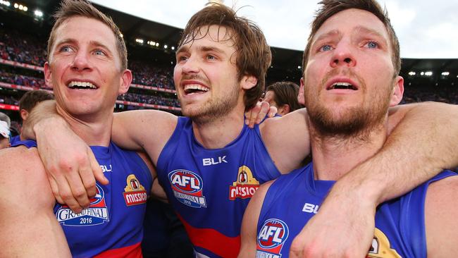 Dale Morris, Joel Hamling and Matthew Boyd celebrate after winning the Grand Final. Picture: Getty Images