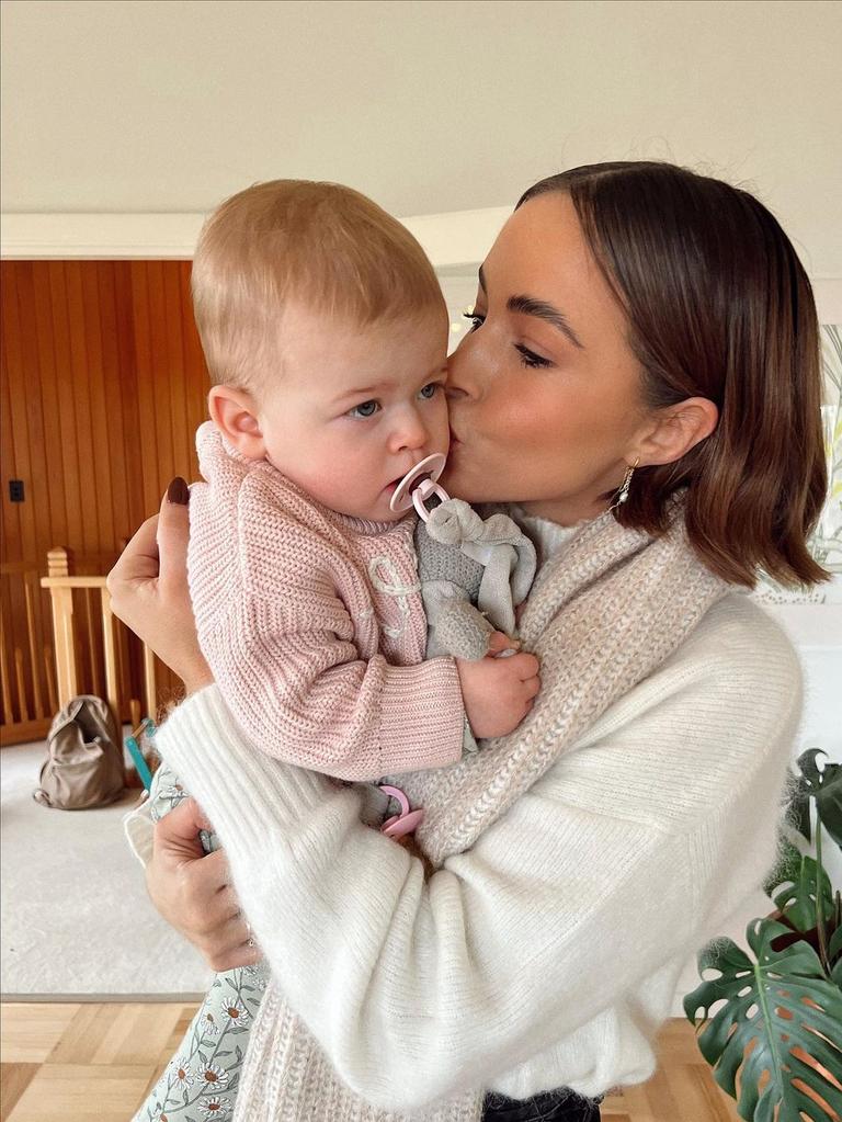 Olivia Molly Rogers with a baby. Picture: Instagram